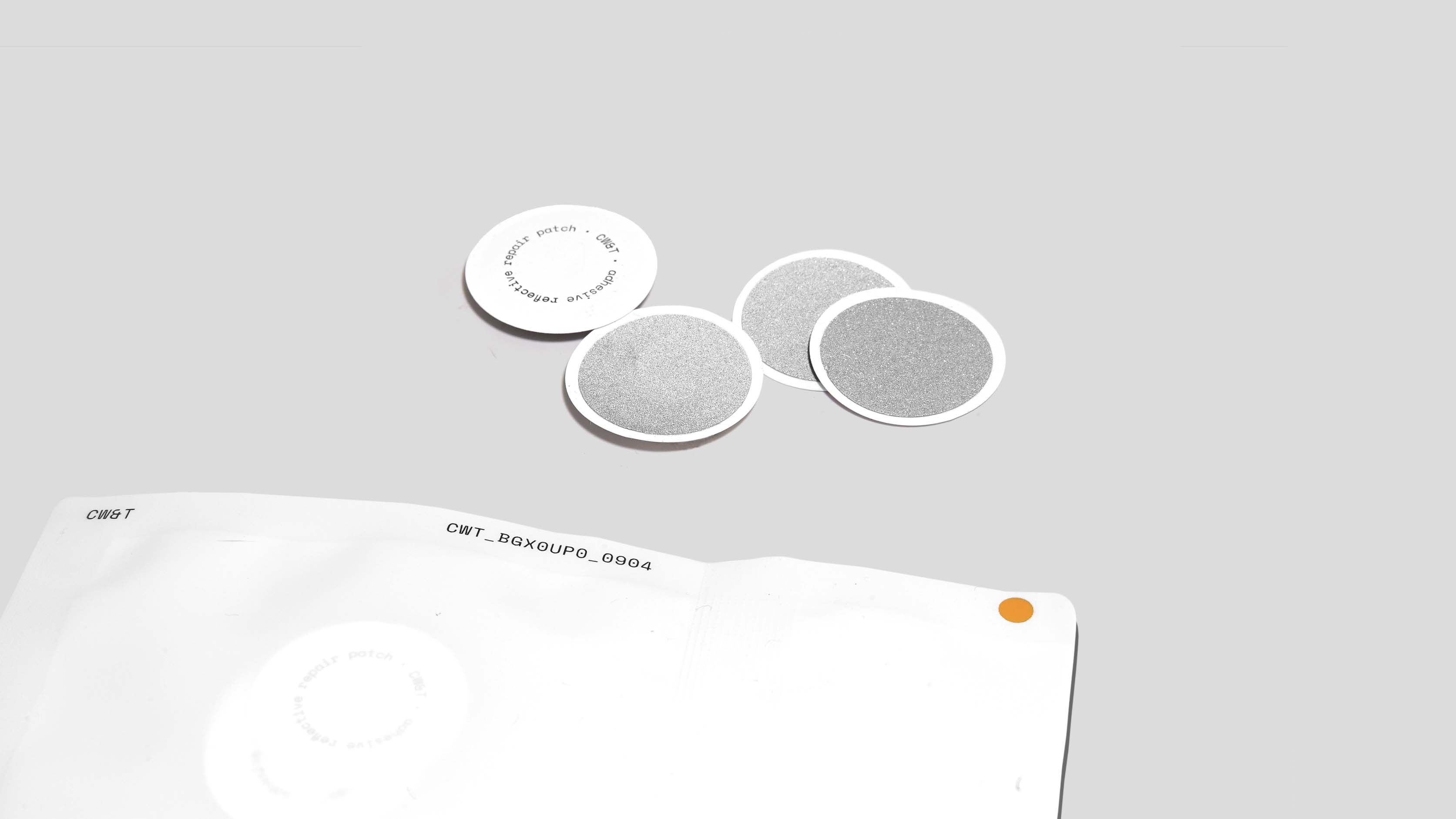 Adhesive reflective repair patch