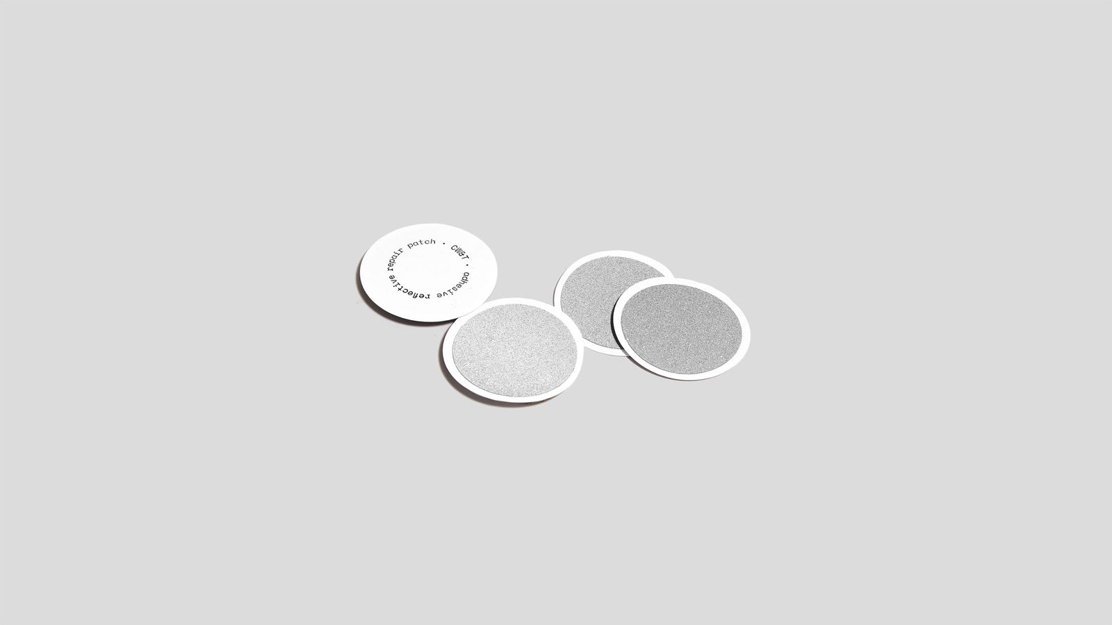 Adhesive reflective repair patch